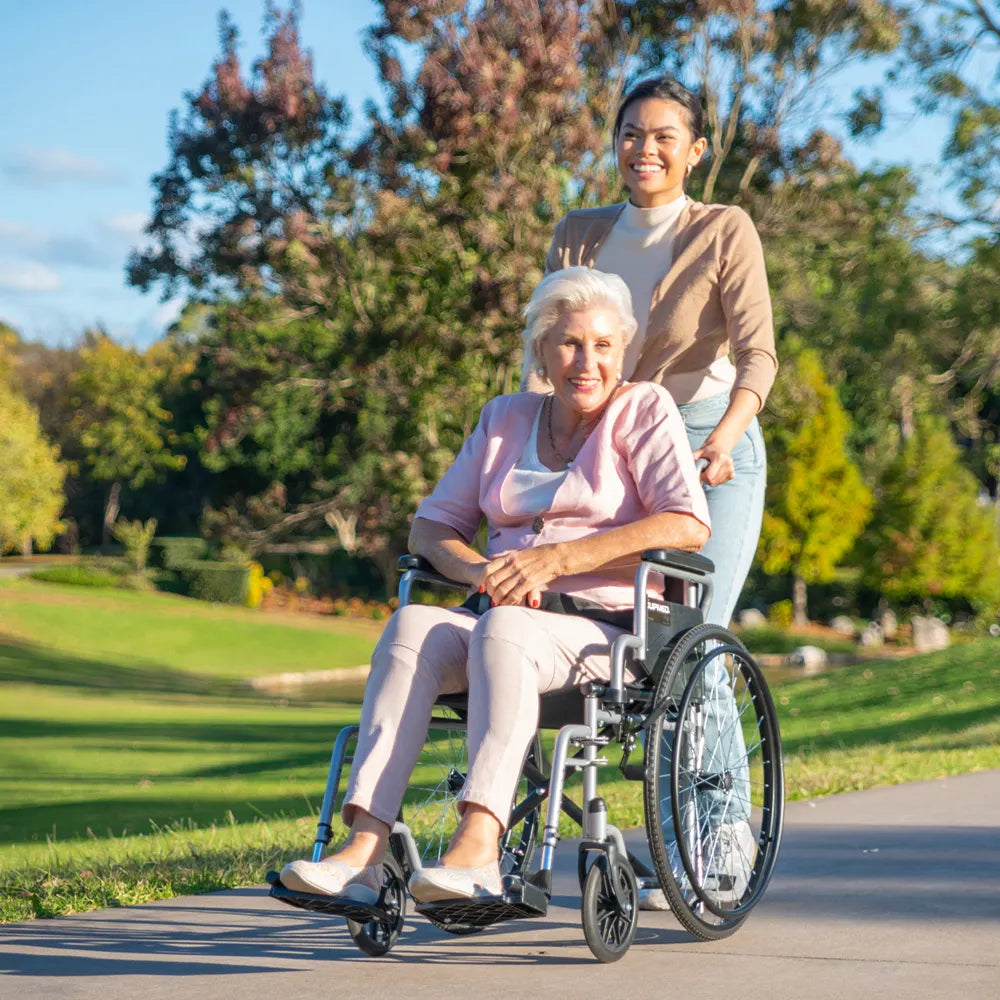 24 Inch Folding Wheelchair with Park Brakes, 136kg Capacity, Retractable Armrests, Grey